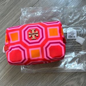Tory Burch vivid orange makeup toiletry bag